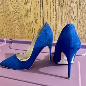 Royal blue heels, warn once